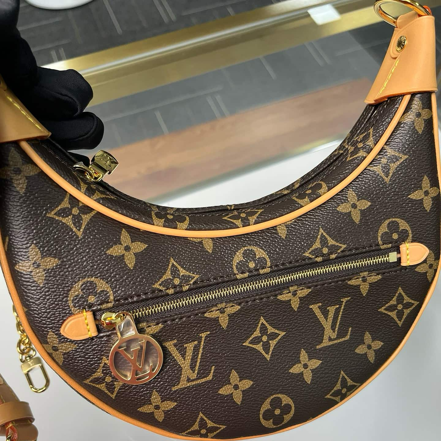 LOUIS VUITTON Loop handbag half-moon silhouette front zip pocket